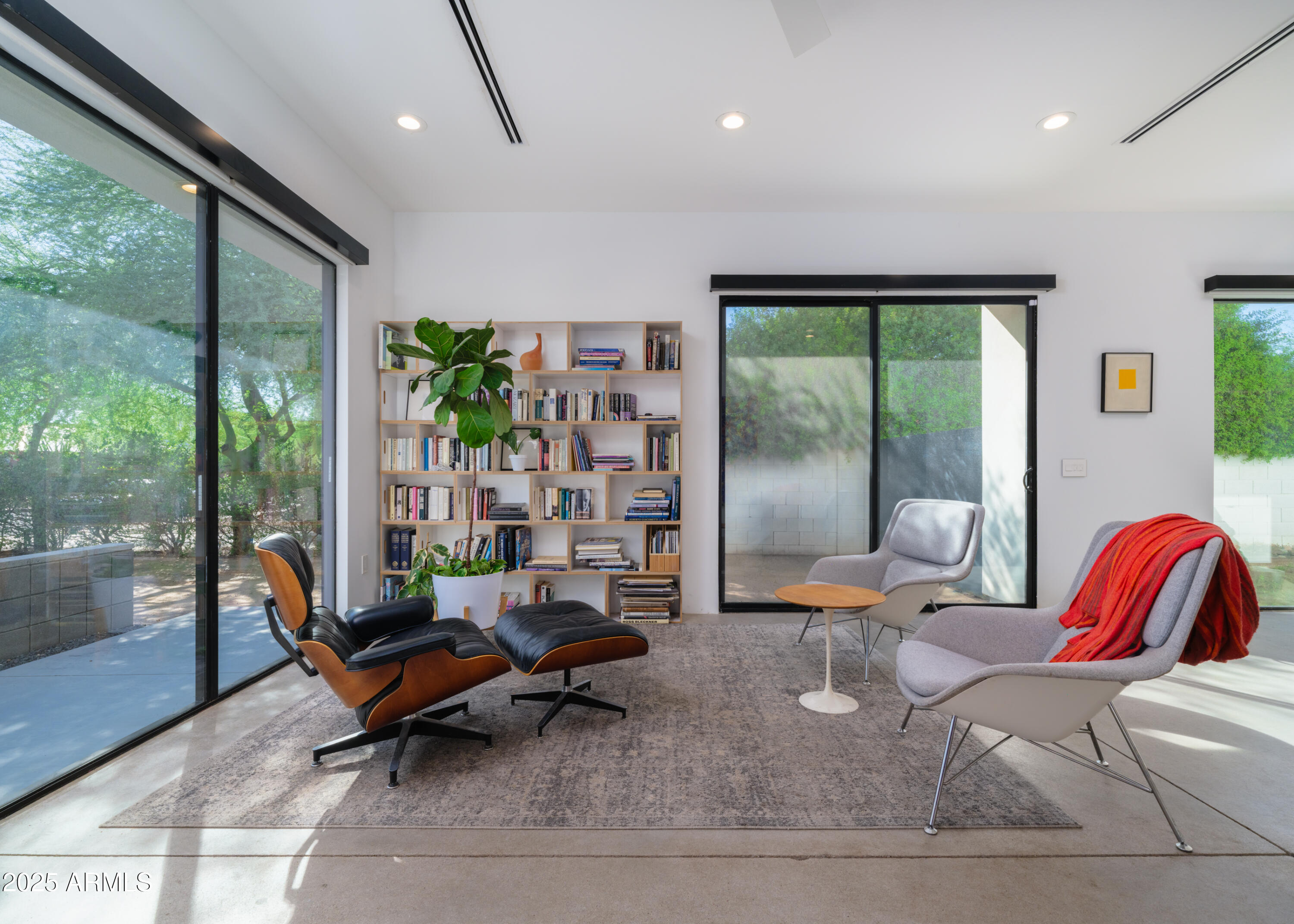 1526 East Coronado Road Phoenix, AZ 85006 - Photo 2 of 39 a living room with furniture and a floor to ceiling window