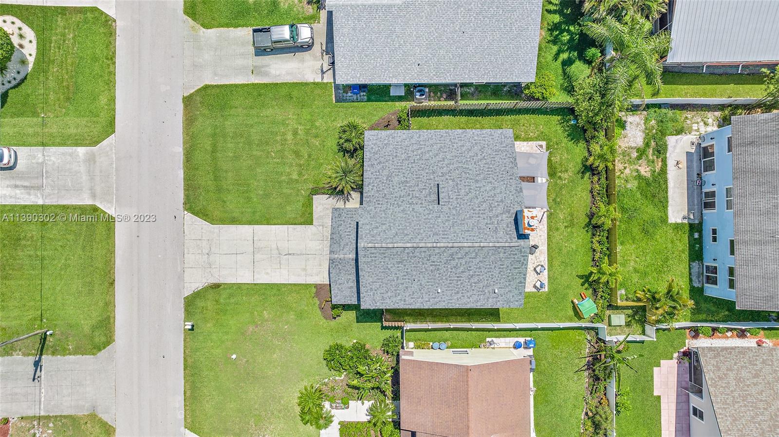 6122 Adams Street Jupiter, FL 33458 - Photo 35 of 59 an aerial view of a house