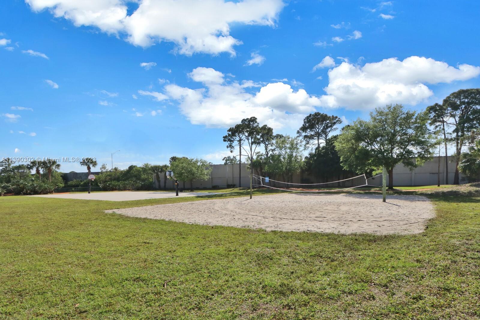 6122 Adams Street Jupiter, FL 33458 - Photo 46 of 59 a view of an outdoor space and yard