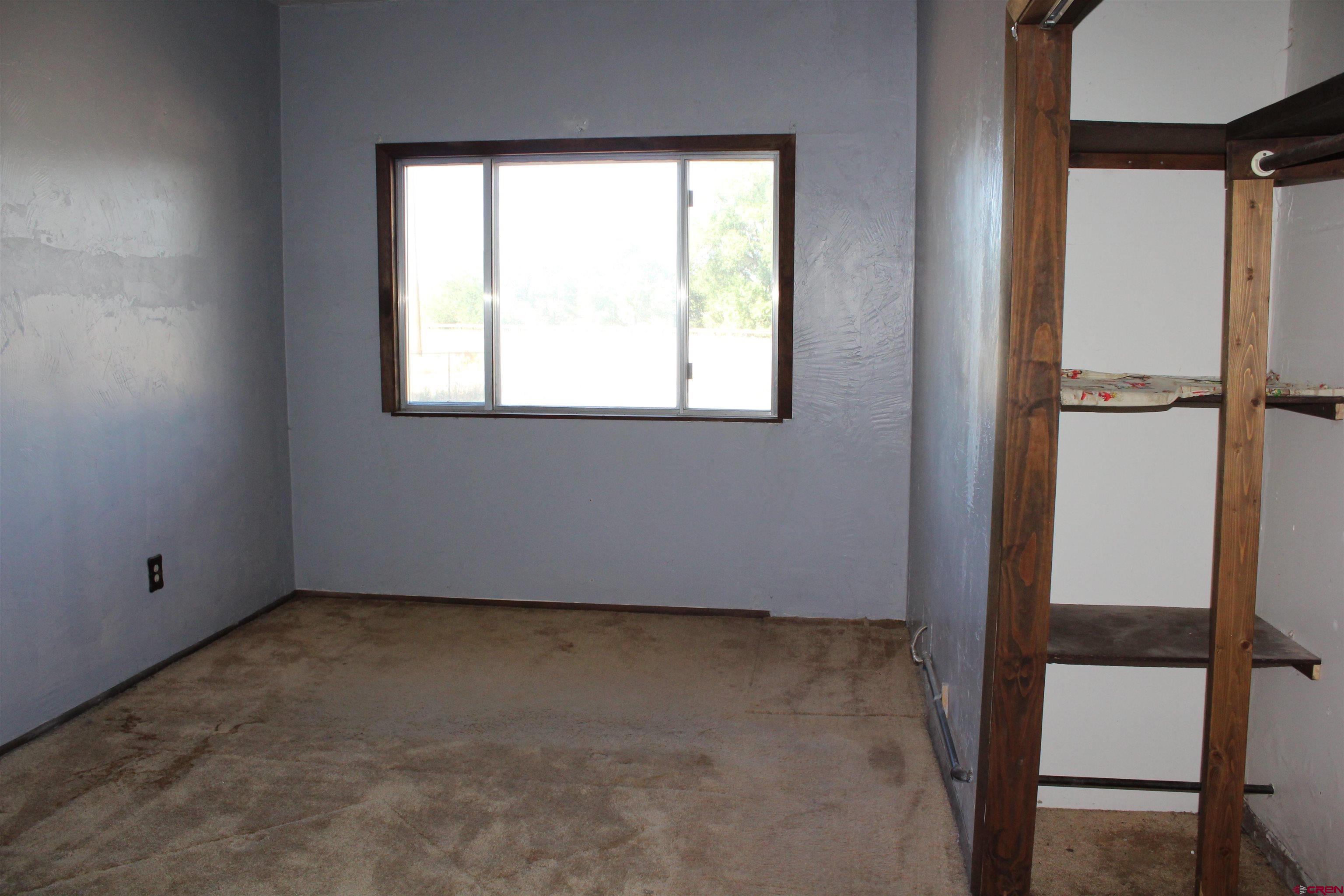 23892 County Rd M Cortez, CO 81321 - Photo 17 of 27 an empty room with a window