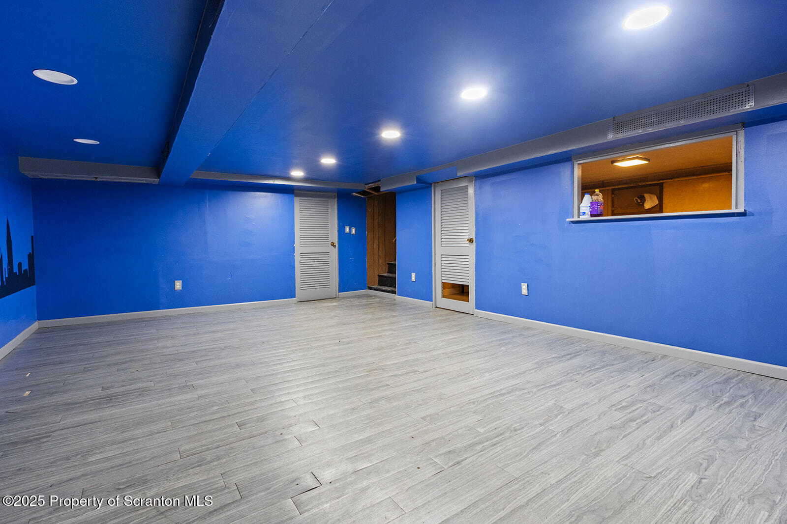 511 Fig Street Scranton, PA 18505 - Photo 28 of 33 a view of an empty room with wooden floor