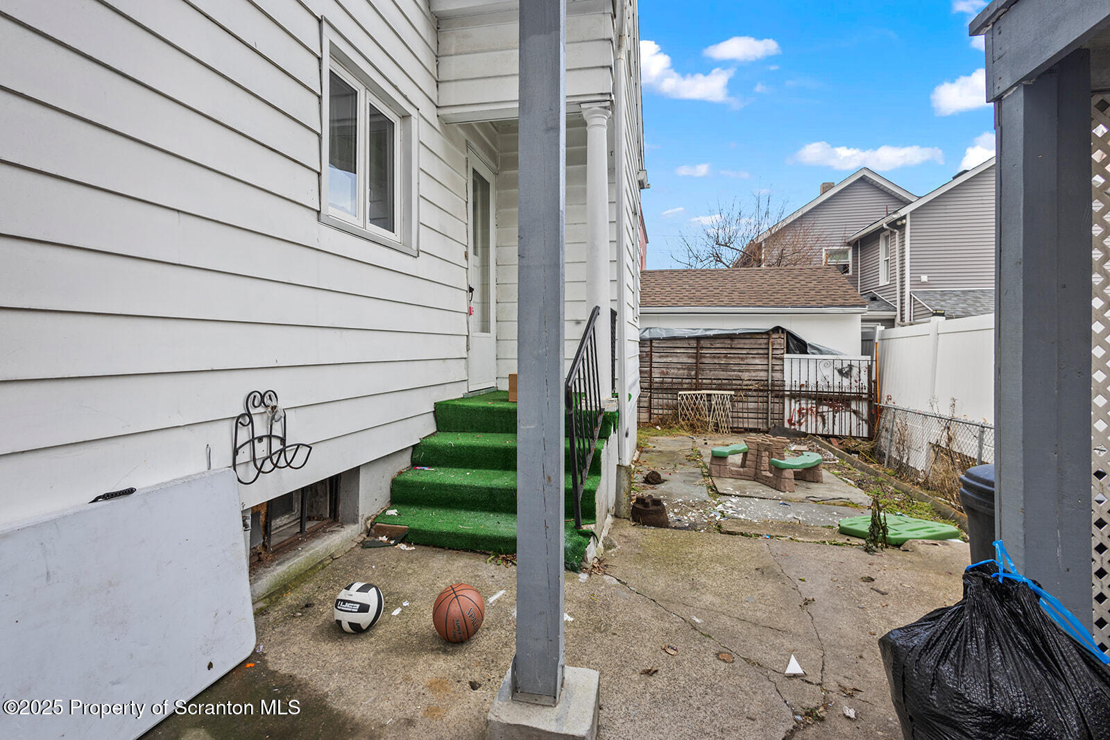 511 Fig Street Scranton, PA 18505 - Photo 33 of 33 a view of a patio with table and chairs a barbeque