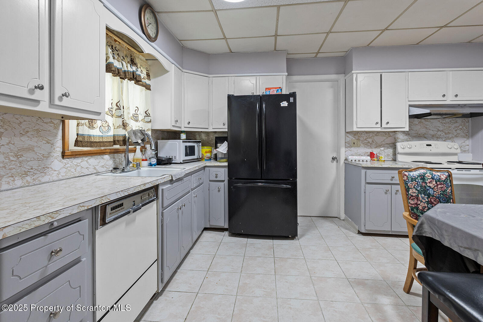 511 Fig Street Scranton, PA 18505 - Photo 4 of 33 a kitchen with a sink appliances and cabinets