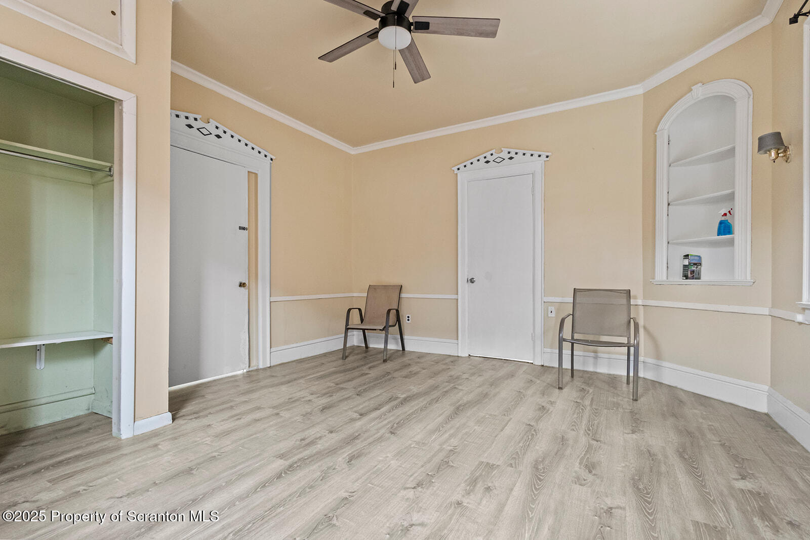 511 Fig Street Scranton, PA 18505 - Photo 8 of 33 a view of a livingroom with a furniture and a ceiling fan