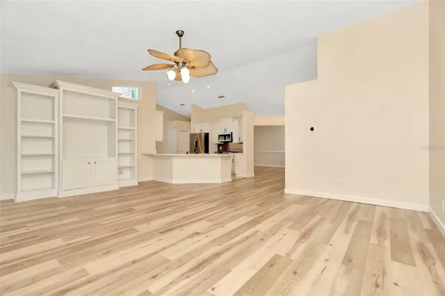 a view of a livingroom with wooden floor