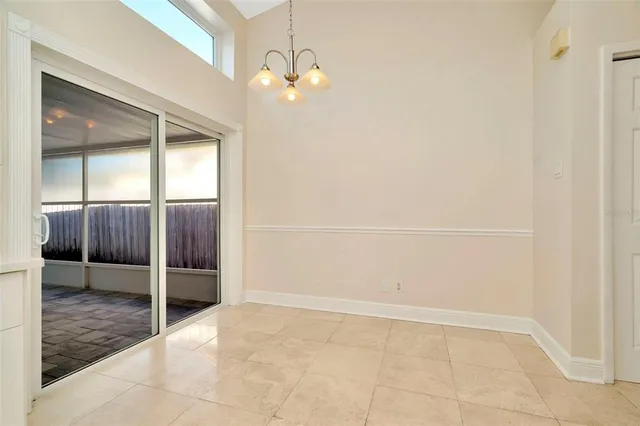 an empty room with fan