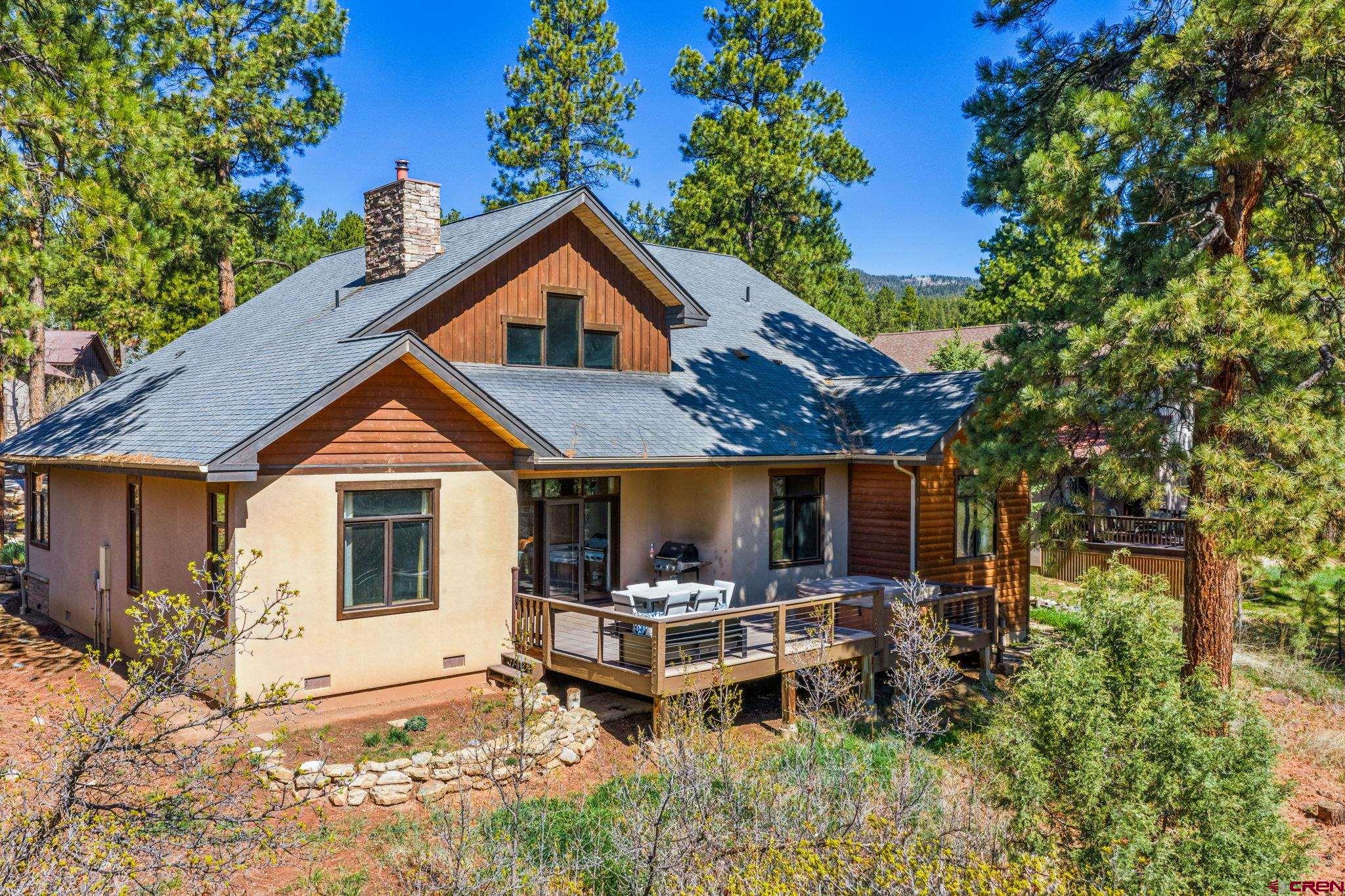 70 Clear Creek Loop Durango, CO 81301 - Photo 30 of 35 a backyard of a house with yard barbeque oven and outdoor seating