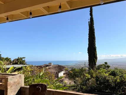 a bedroom with bed and window