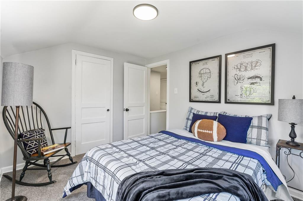 322 Bascom Avenue Pittsburgh, PA 15214 - Photo 15 of 29 a bedroom with bed and chair