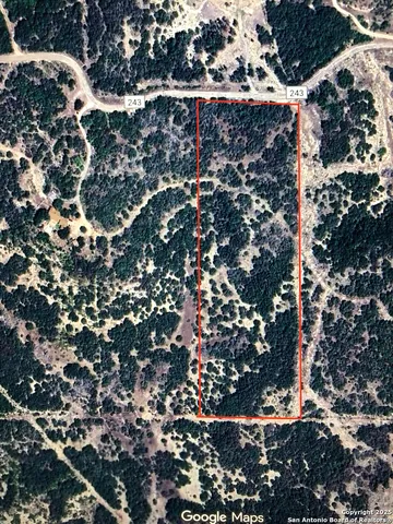 a view of a lake with mountains in the background