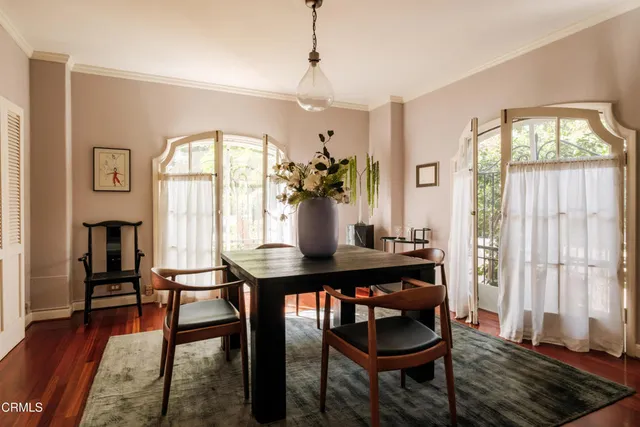 a view of a room with a door and chair
