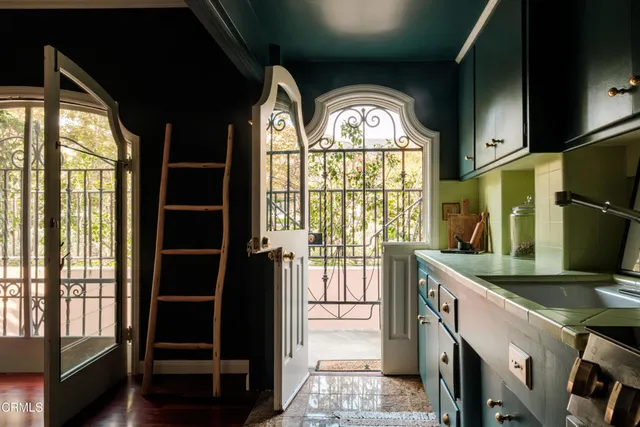 a bed room with a bed and a window