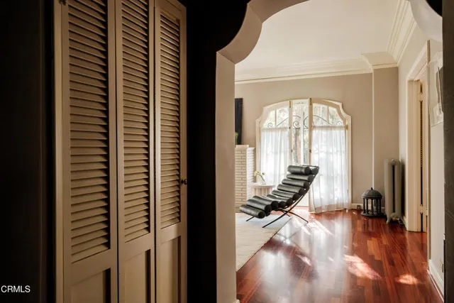 a bathroom with a sink mirror toilet and shower