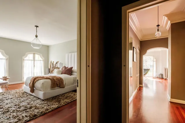 a bathroom with a sink mirror and shower