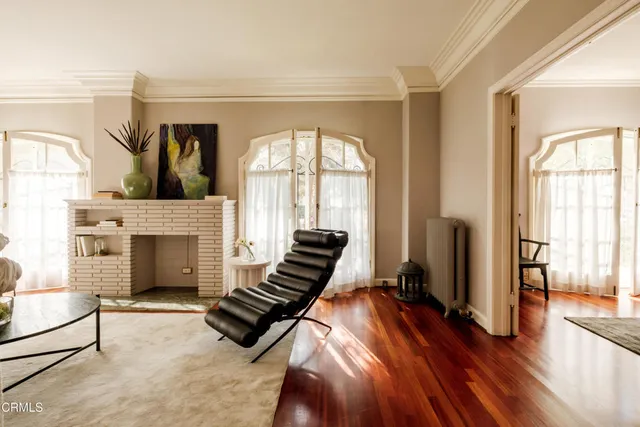 a view of a porch with a floor to ceiling windows