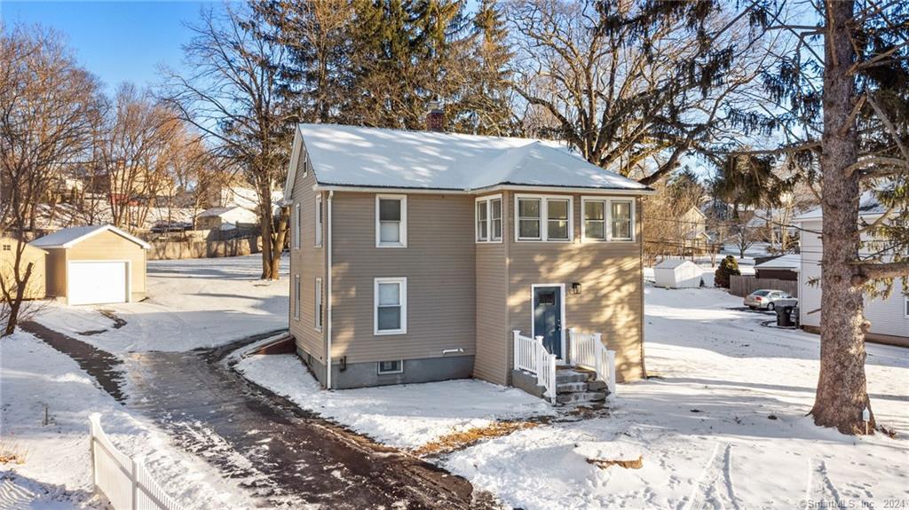 89 Old Turnpike Road Southington, CT 06489 - Photo 1 of 1 a front view of a house with a yard