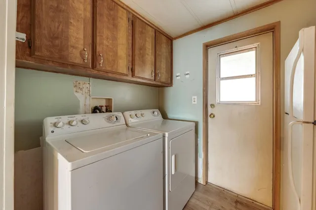 a utility room with dryer and washer