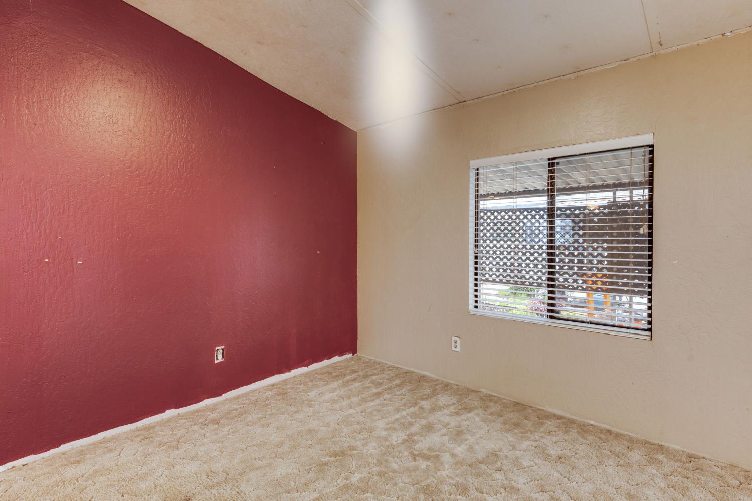 443 Royal Crest Circle Rancho Cordova, CA 95670 - Photo 7 of 28 a view of an empty room with a window