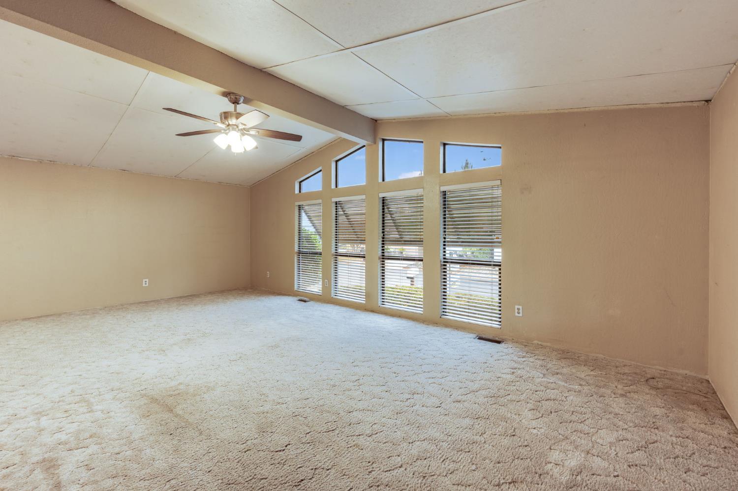 443 Royal Crest Circle Rancho Cordova, CA 95670 - Photo 8 of 28 a view of an empty room with a window