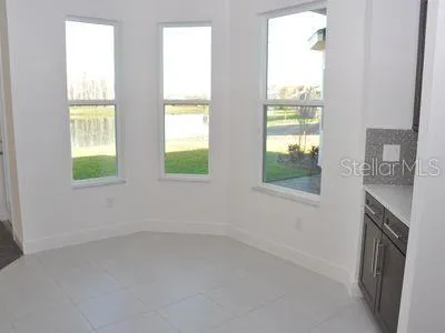 an empty room with windows