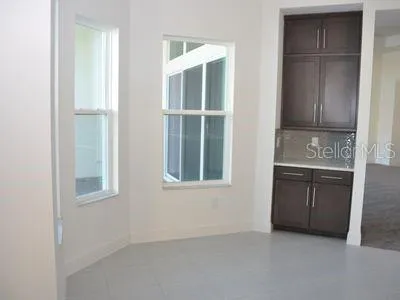 a view of a living room with furniture