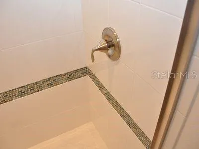 a street sign on a pole on a street