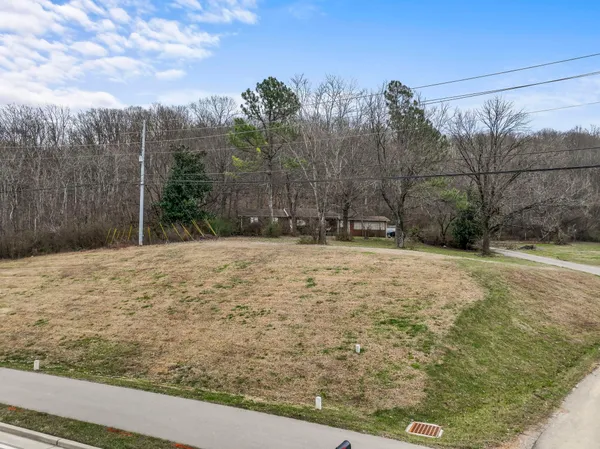 a view of a backyard of a house