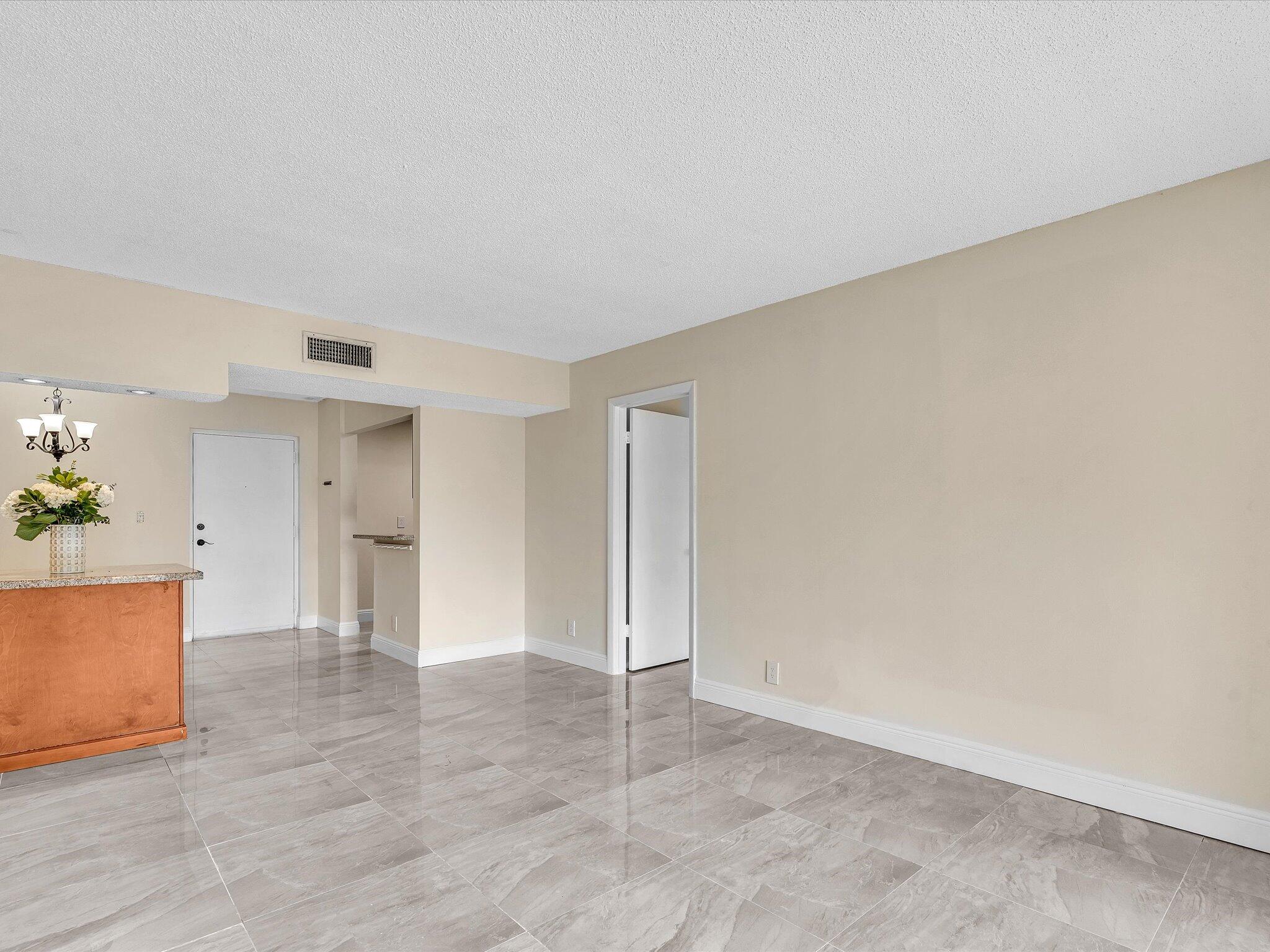 470 Northwest 20th Street, Unit 3020 Boca Raton, FL 33431 - Photo 12 of 43 Living - Kitchen