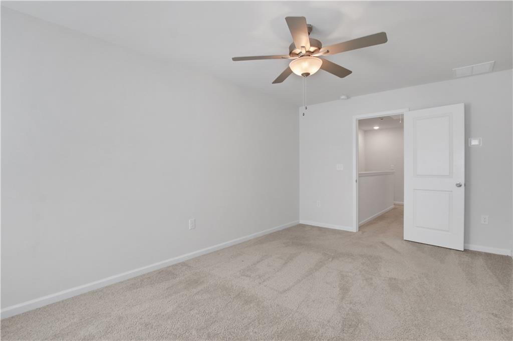102 Jaxton Street Hoschton, GA 30548 - Photo 22 of 36 an empty room