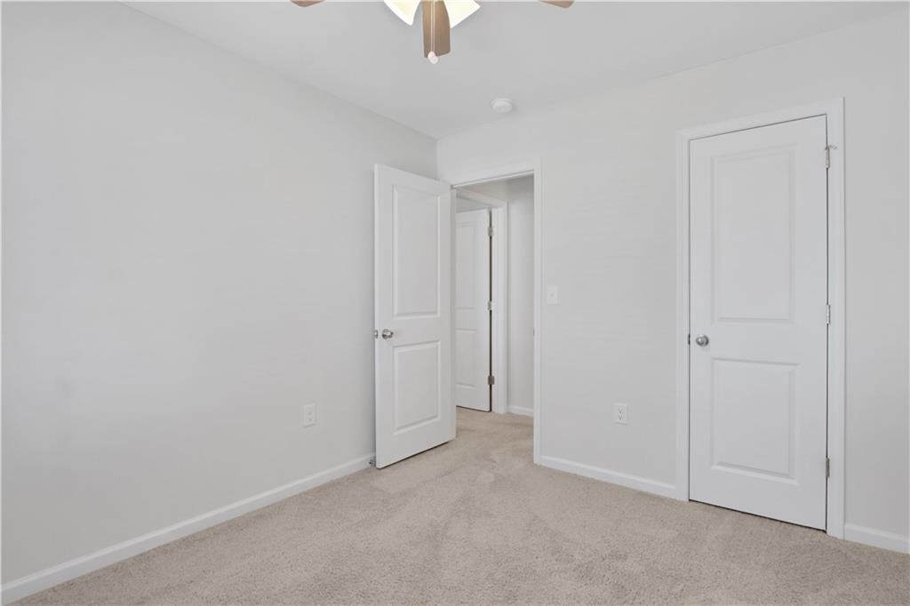 102 Jaxton Street Hoschton, GA 30548 - Photo 28 of 36 a view of an empty room