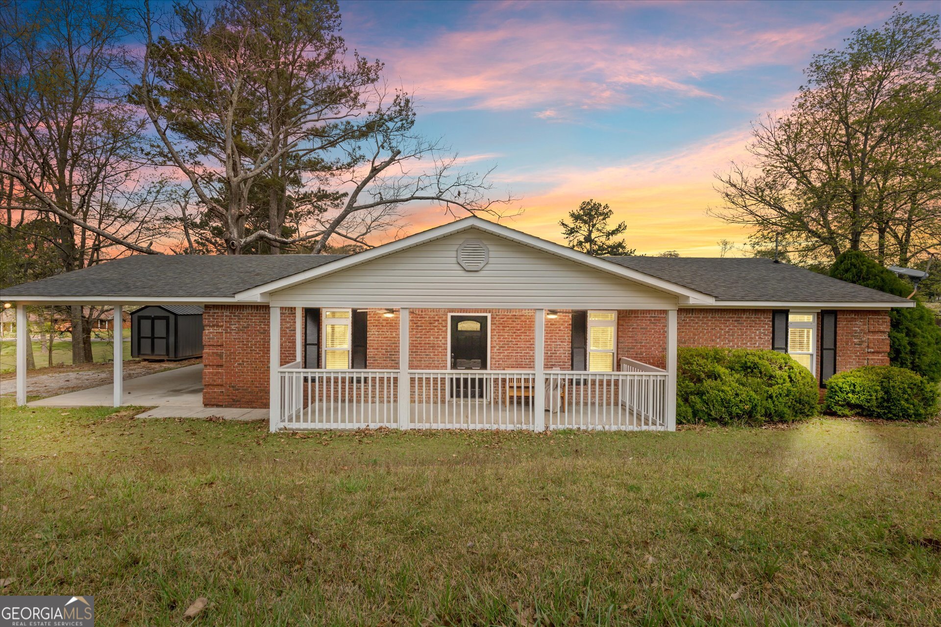 269 Eldred Street Lineville, AL 36266 - Photo 2 of 11 a front view of a house with a garden