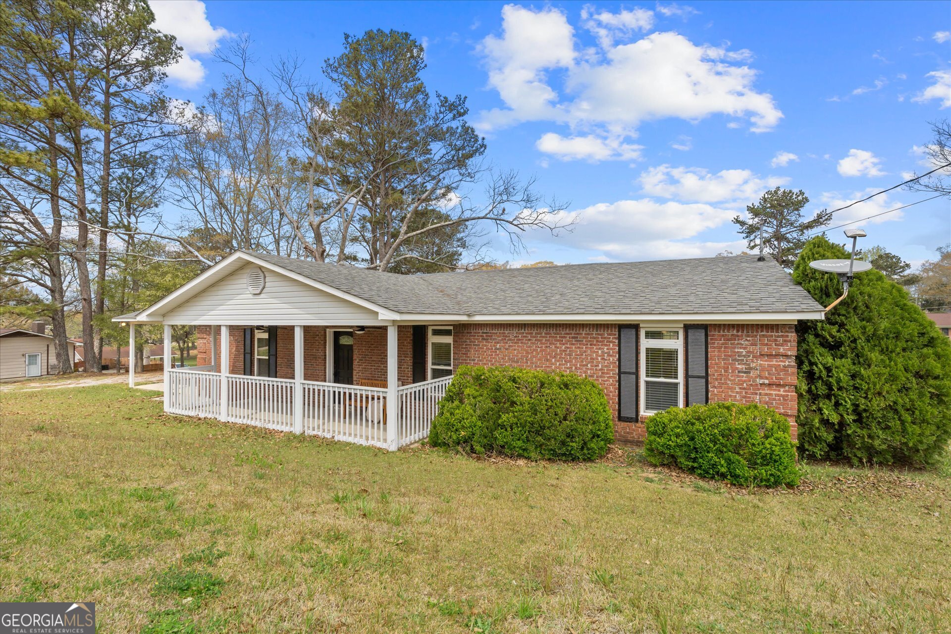 269 Eldred Street Lineville, AL 36266 - Photo 6 of 11 front view of a house with a yard