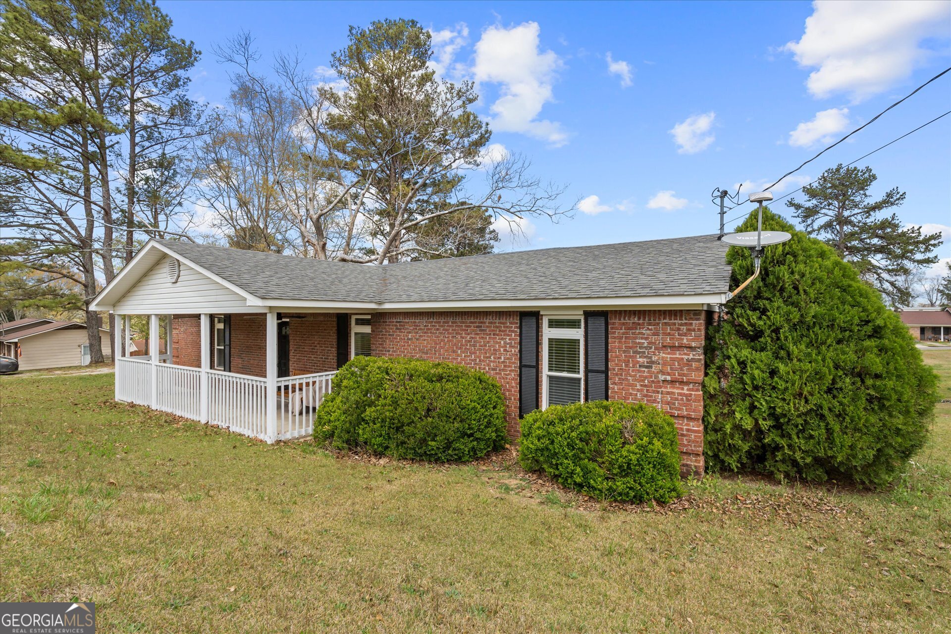 269 Eldred Street Lineville, AL 36266 - Photo 7 of 11 front view of a house with a yard