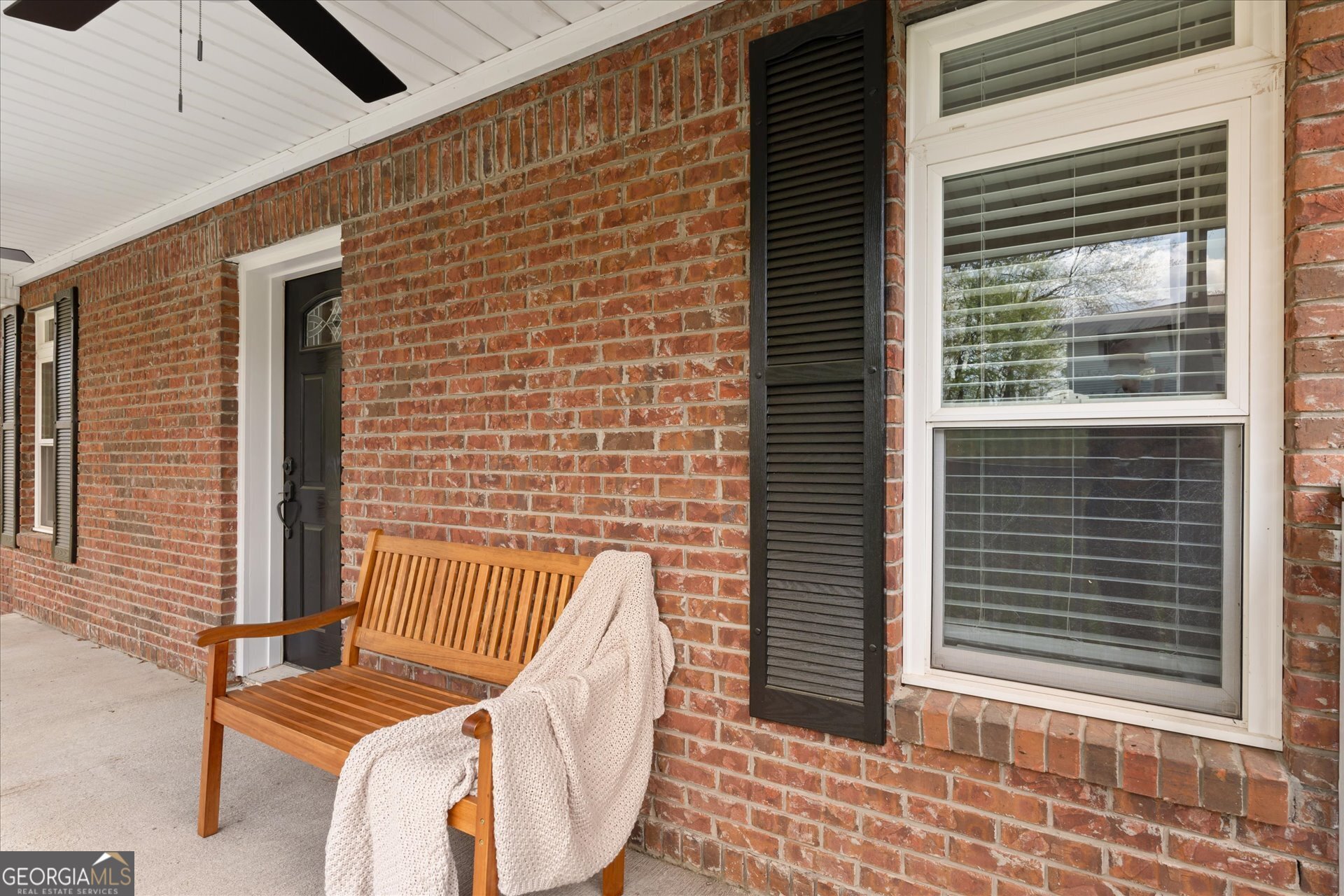 269 Eldred Street Lineville, AL 36266 - Photo 8 of 11 a view of a balcony with chair