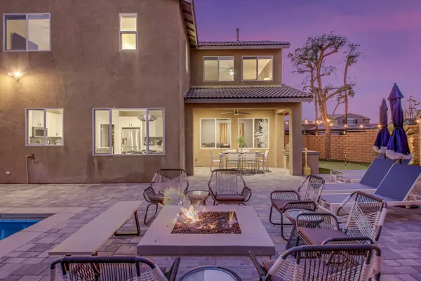 an aerial view of residential houses and outdoor space