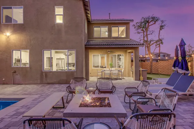 an aerial view of residential houses and outdoor space