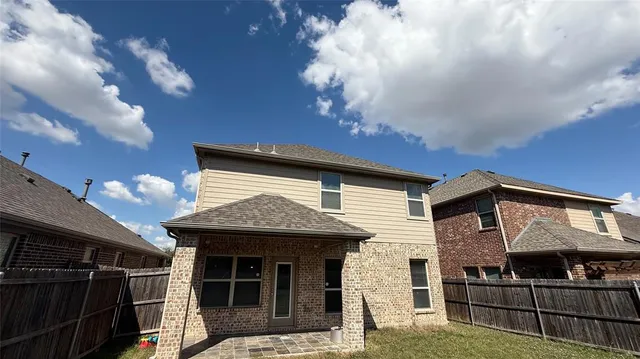 a front view of a house with balcony