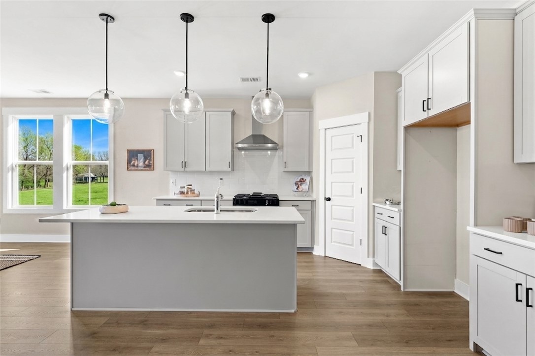 334 Summerall Drive Anderson, SC 29621 - Photo 28 of 28 This bright kitchen features a spacious island and modern appliances, perfect for everyday living.