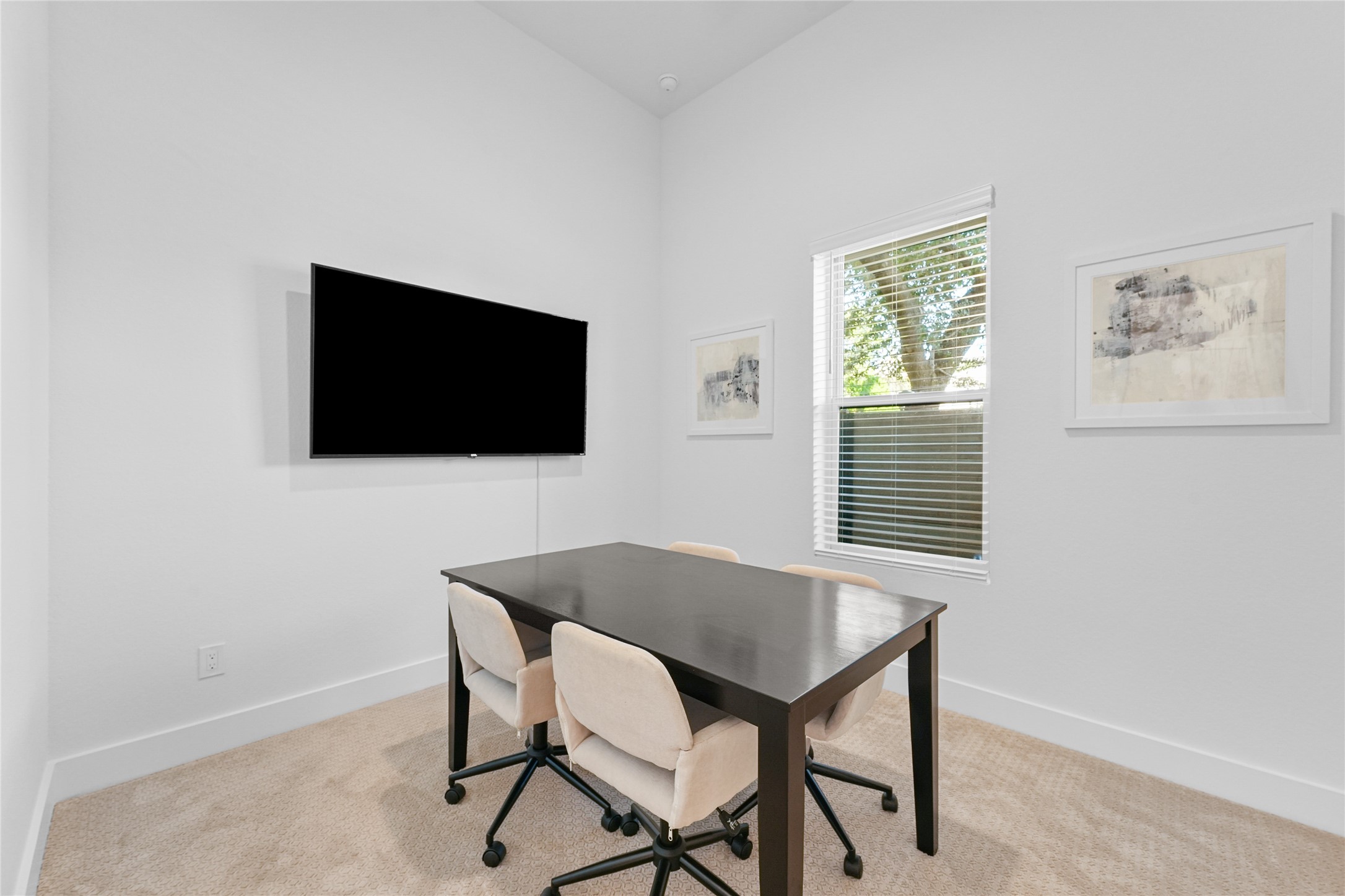 1503 Vermont Street, Unit A Houston, TX 77006 - Photo 23 of 38 a view of a livingroom with furniture and a flat screen tv