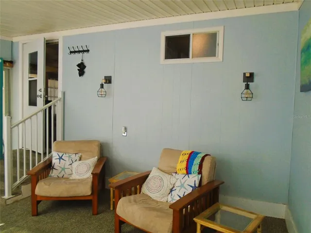 a view of storage and utility room with washer and dryer