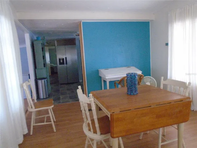 a view of a dining room with furniture