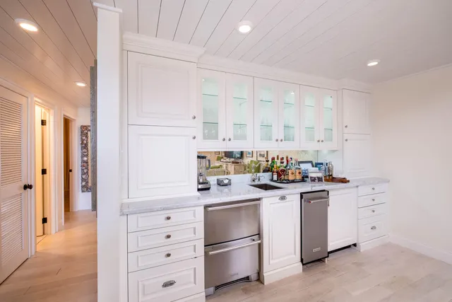 a bed room with furniture and a chandelier