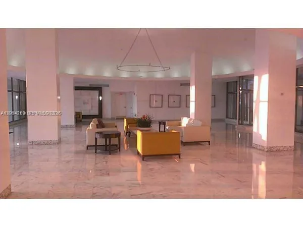 a view of swimming pool with outdoor seating