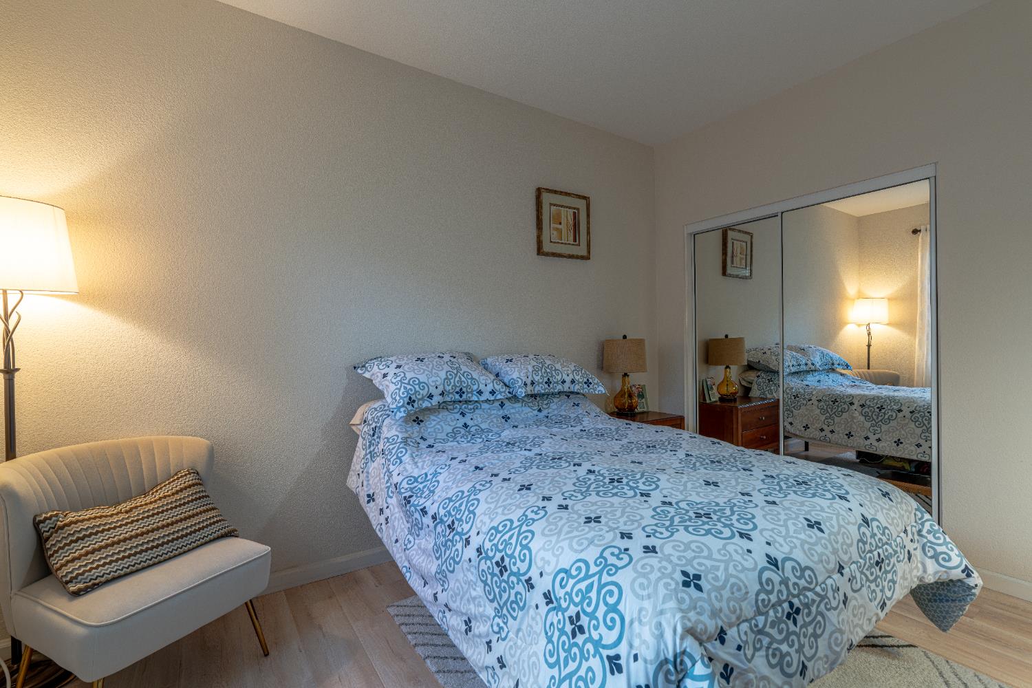 3710 Huntington Road West Sacramento, CA 95691 - Photo 34 of 46 a bedroom with a bed and wooden floor