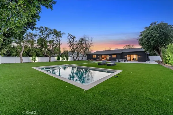 a view of a house with a swimming pool