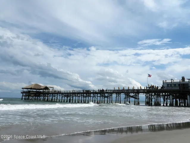 a view of a chairs and table in a yard