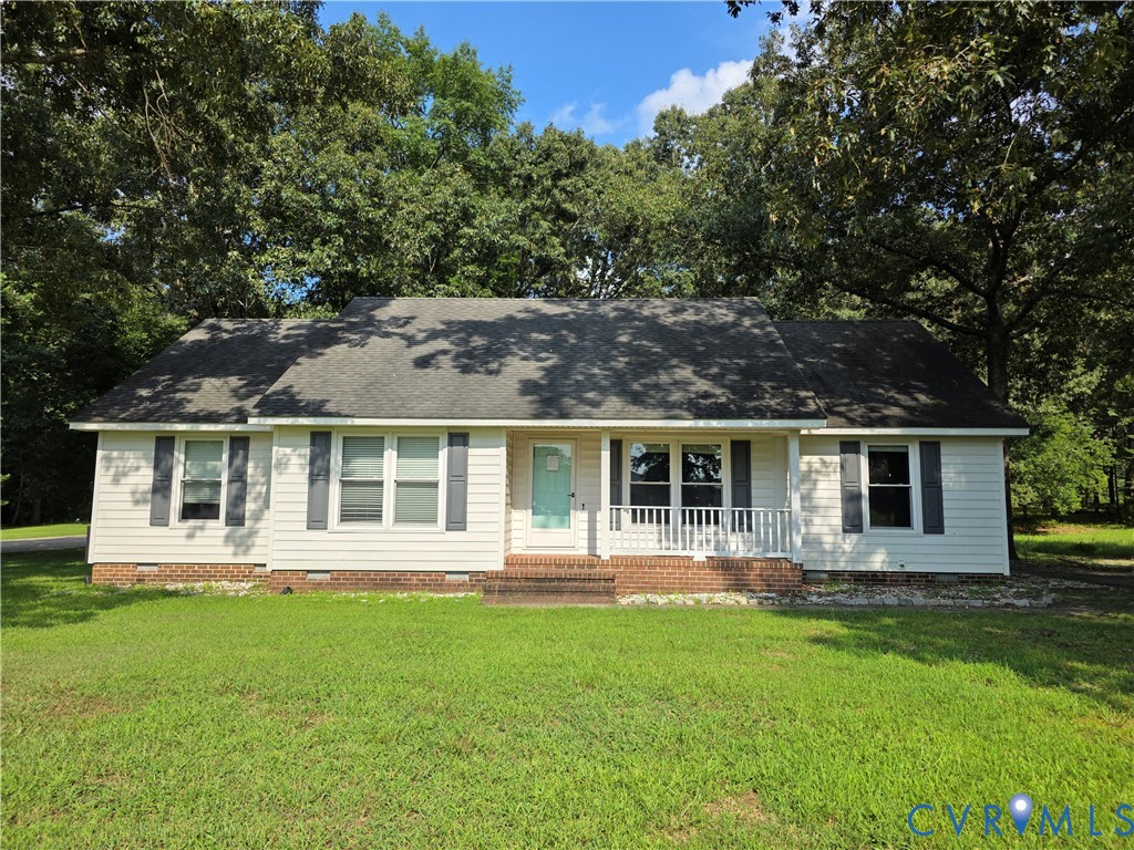 Ranch-style house featuring crawl space, a porch,