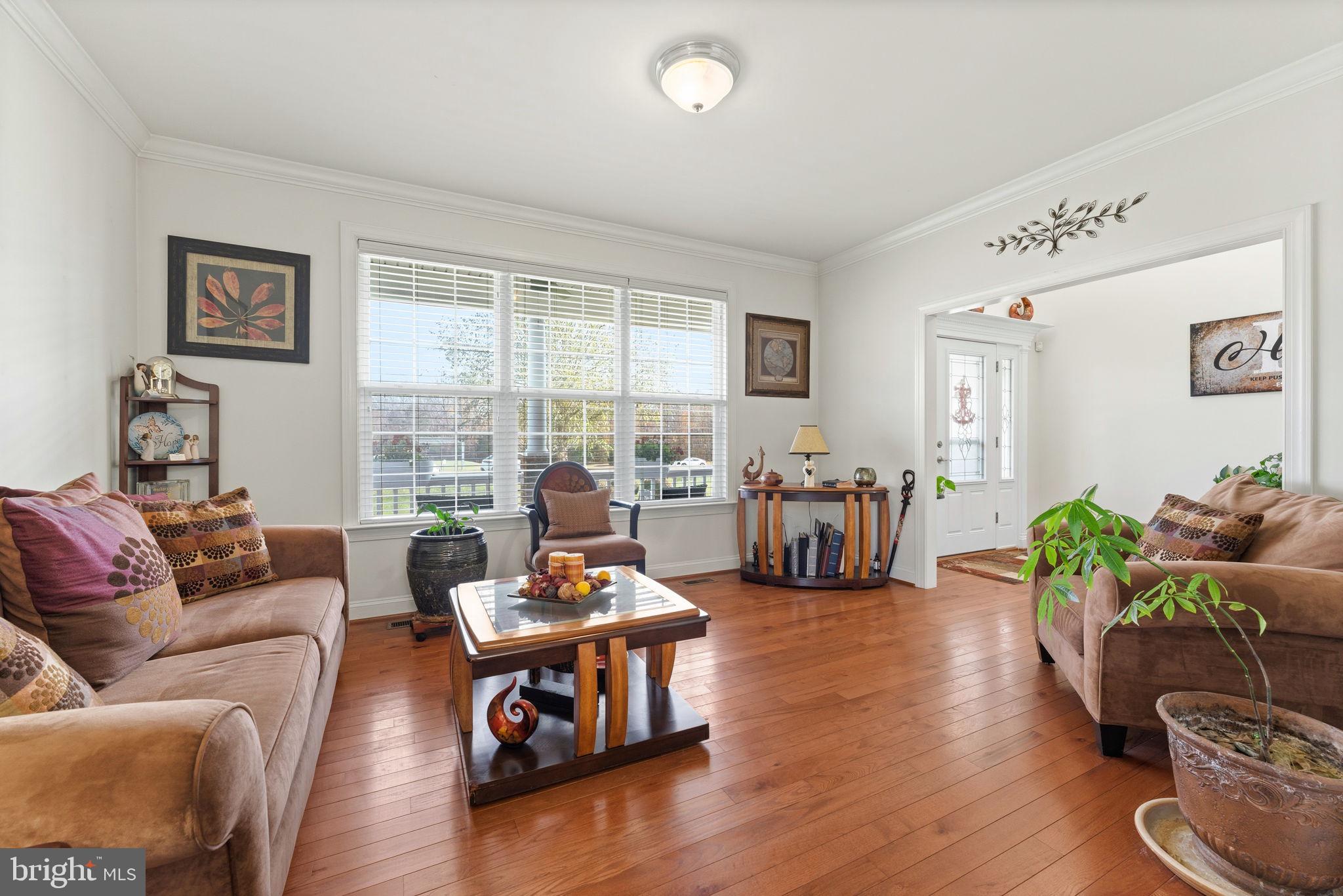 4505 Coachmans Path Court Waldorf, MD 20601 - Photo 12 of 71 a living room with furniture and a large window