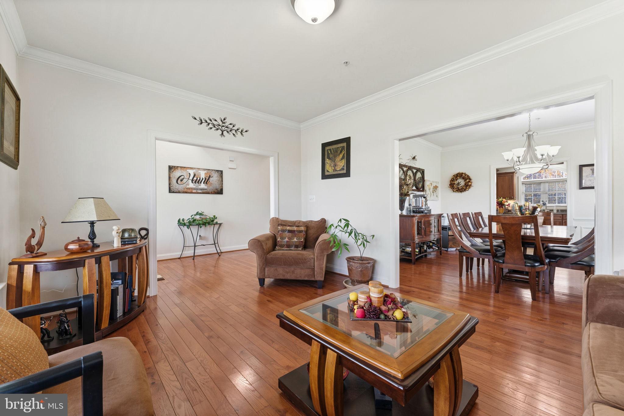 4505 Coachmans Path Court Waldorf, MD 20601 - Photo 13 of 71 a living room with furniture and wooden floor