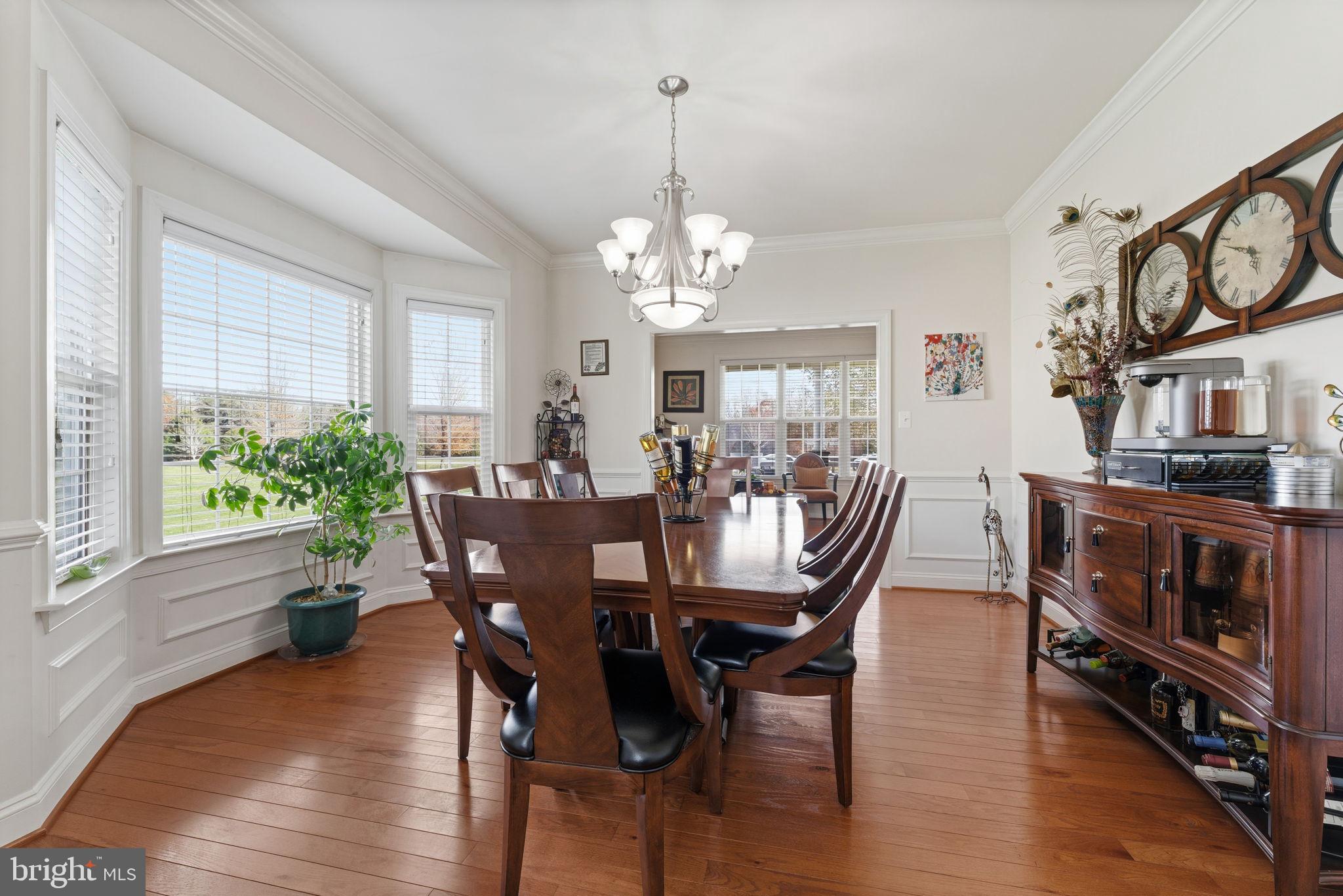 4505 Coachmans Path Court Waldorf, MD 20601 - Photo 17 of 71 a view of a dining room with furniture window and wooden floor
